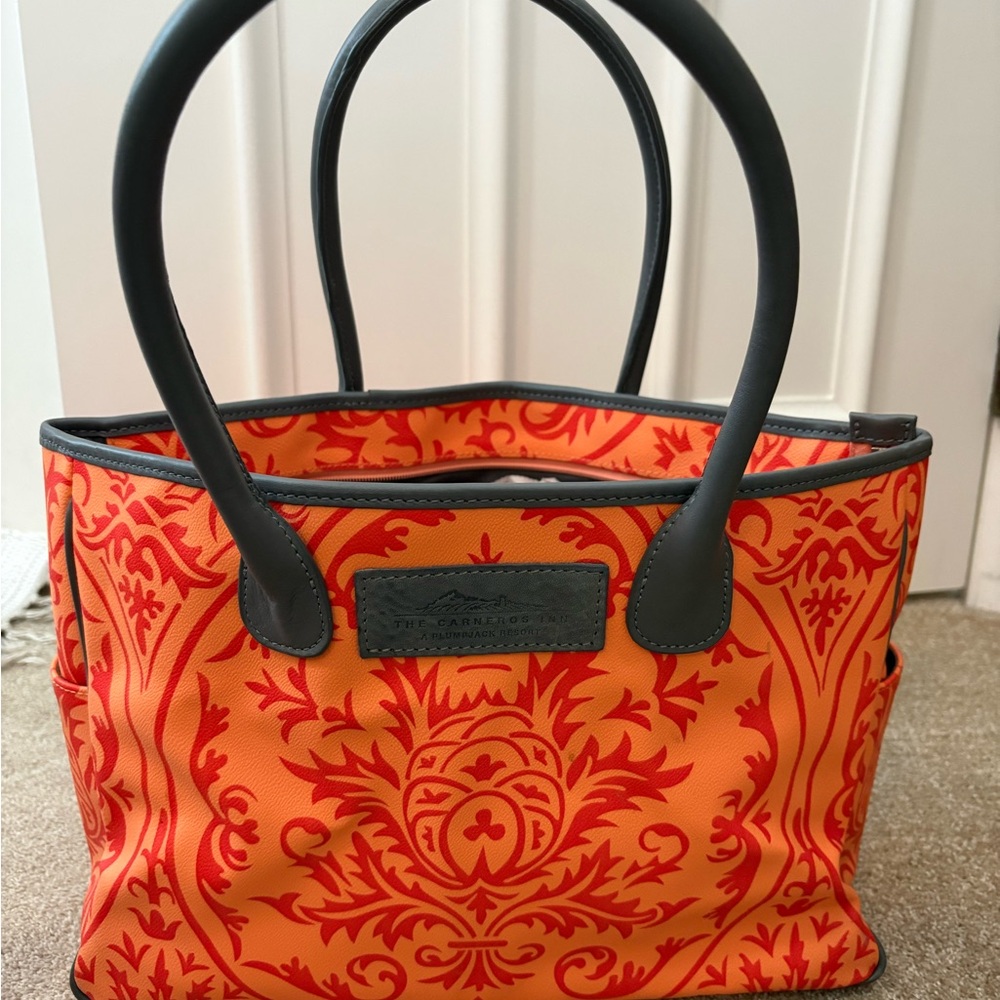 Vibrant Orange on Orange Patterned Tote Bag with small logo tag